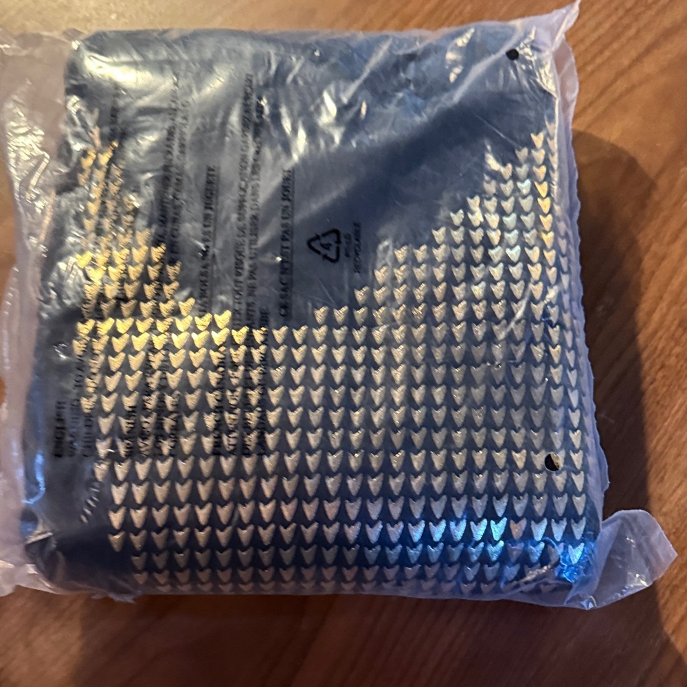 Star Trek sweatshirt in bag her universe